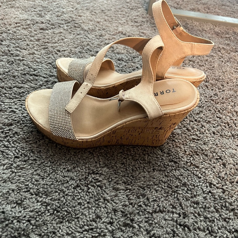 Tan wedges, size 8.5 fits like 9.5. Only worn once.